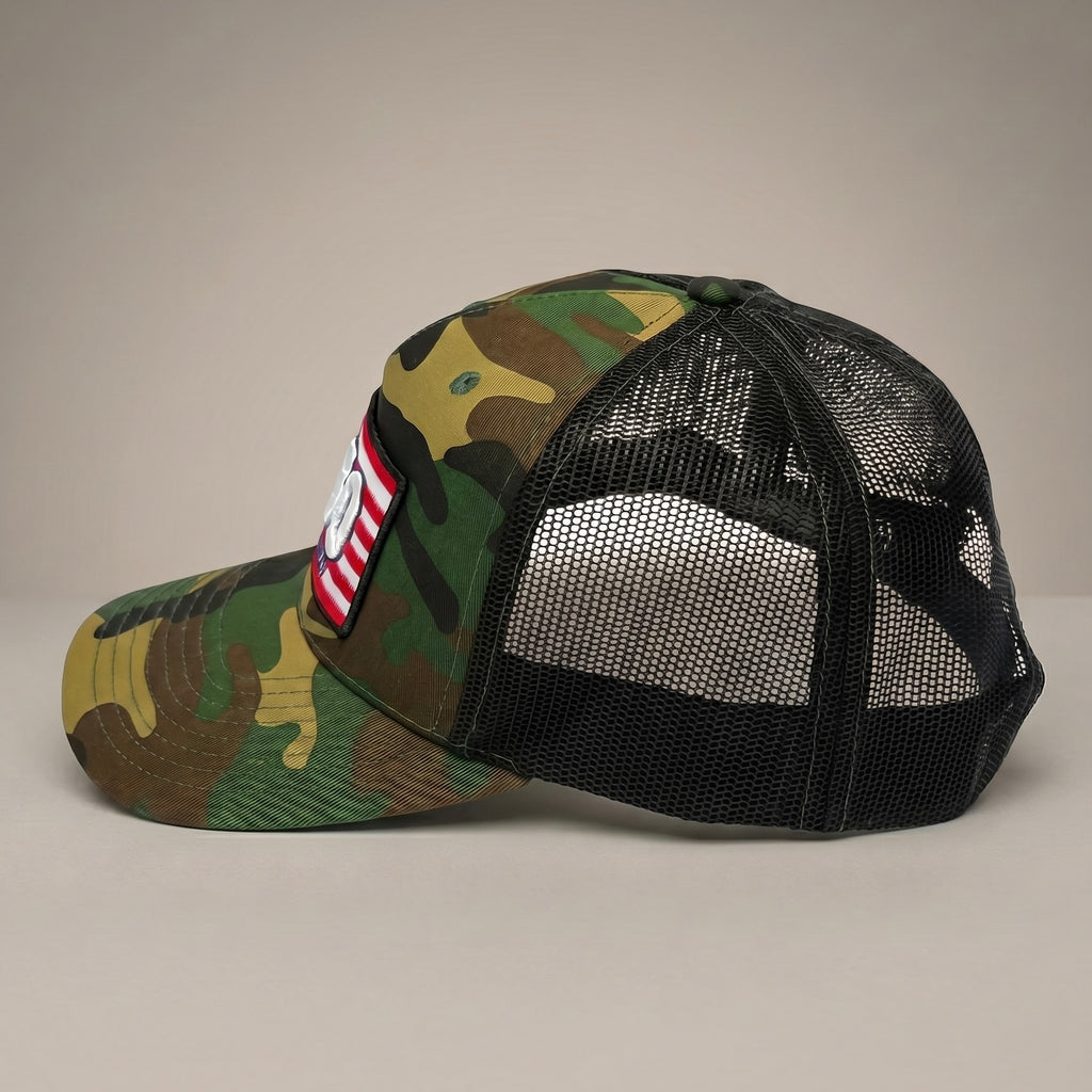 Camouflage trucker cap with mesh back on a beige background American flag 250