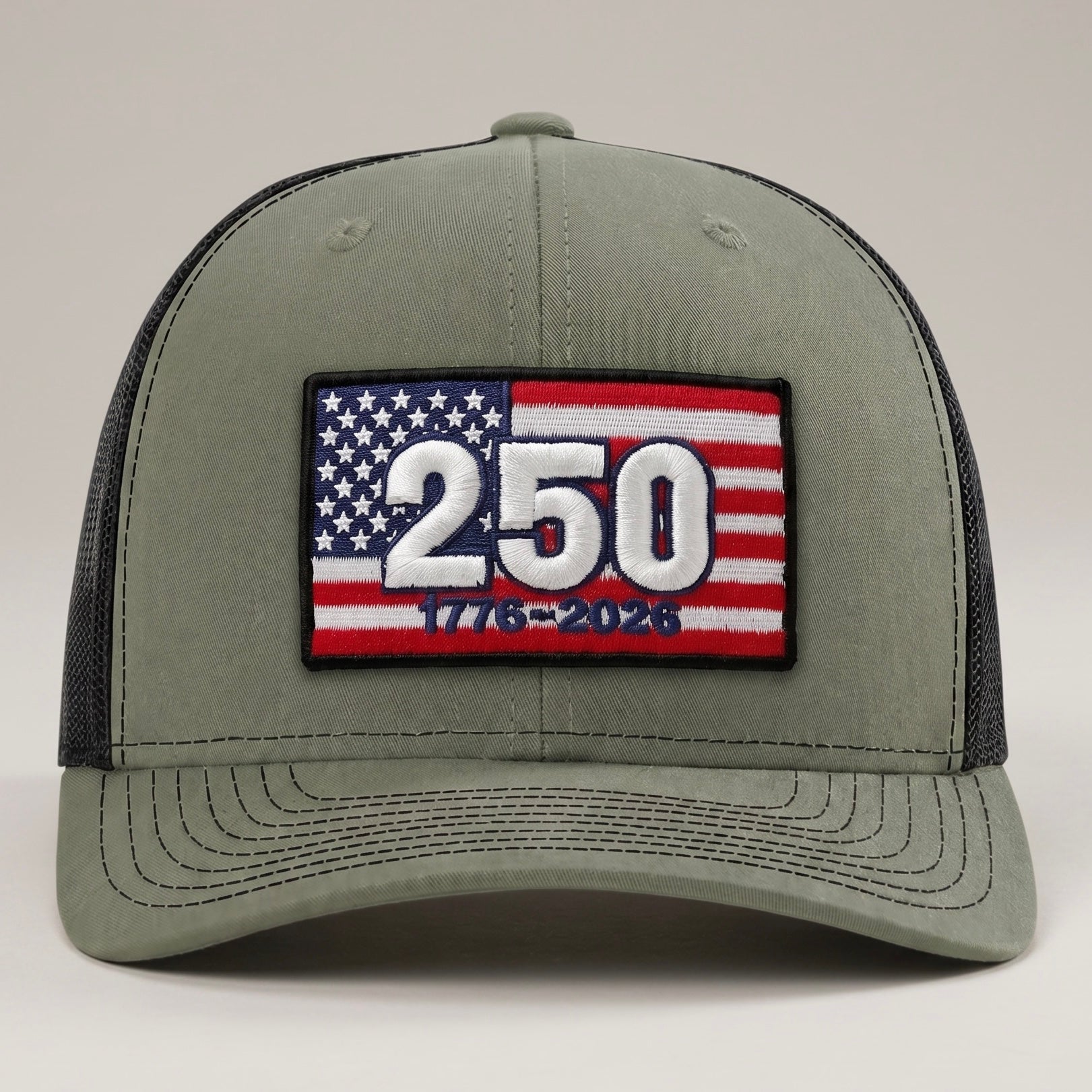 Gray cap with American flag patch featuring the number 250 on a gray background