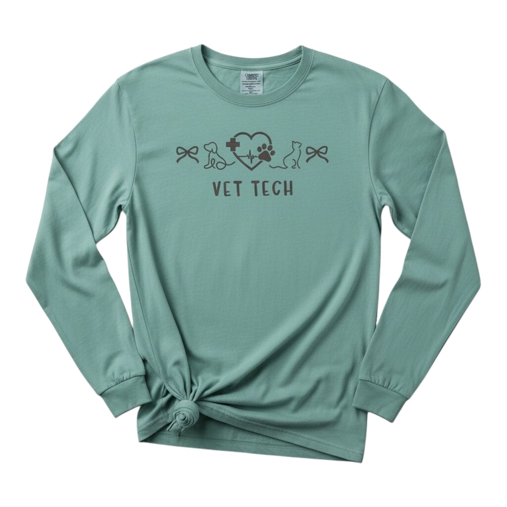 Mint green long-sleeve shirt with 'Vet Tech' design on a white background